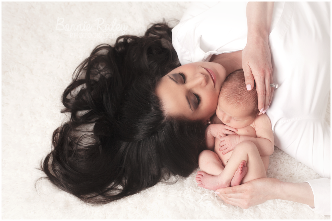 gorgeous momma with long black hair and her newborn baby boy {main line newborn photographer}