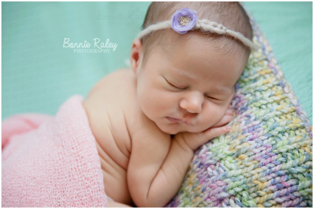 newborn baby girl purple tieback on mint