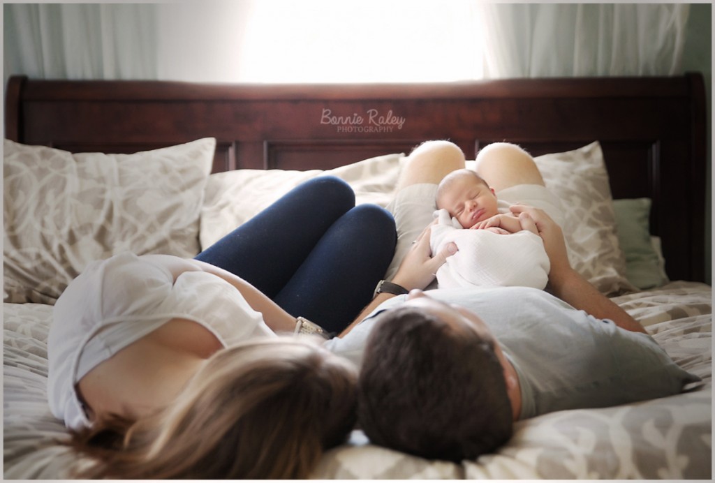 lifestyle image on bed with baby