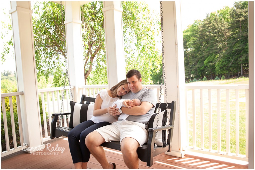 sitting on porch with newborn baby lifestyle photography